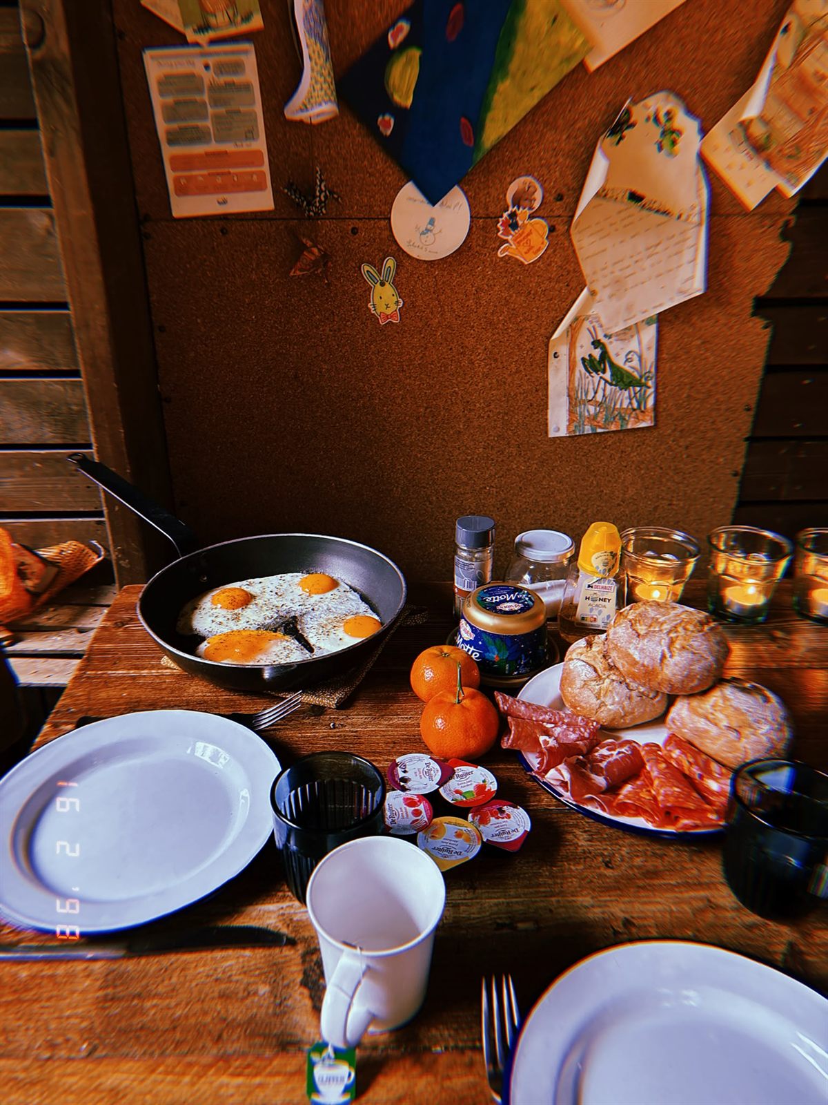 Breakfast laid out in a wooden cabin